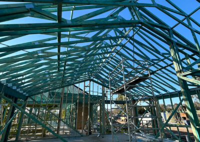Roof trusses lifted into place on a Geelong build
