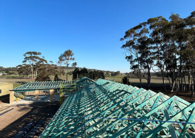 Timber roof trusses craned into place in Armstrong Creek