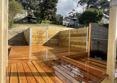 Hardwood deck and timber screens with a view to the backyard